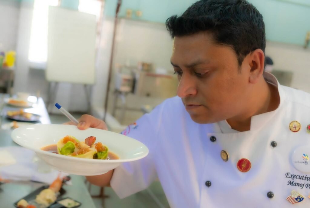 Chef Manoj Pawar preparing a dish